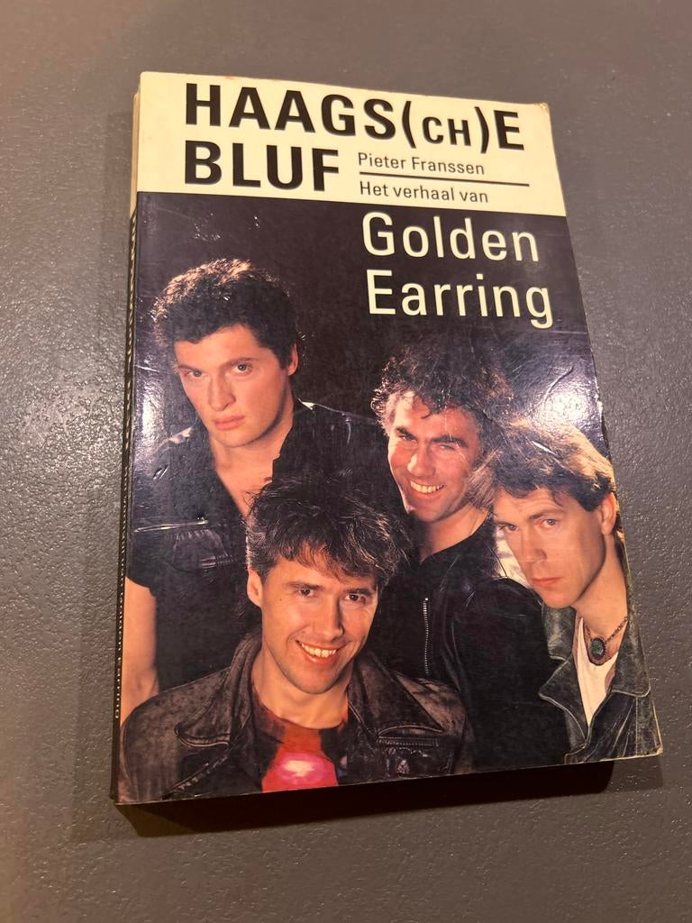 Haags(ch)e Bluf - Golden Earring boek, Ophalen of Verzenden, Zo goed als nieuw, Film, Tv en Media