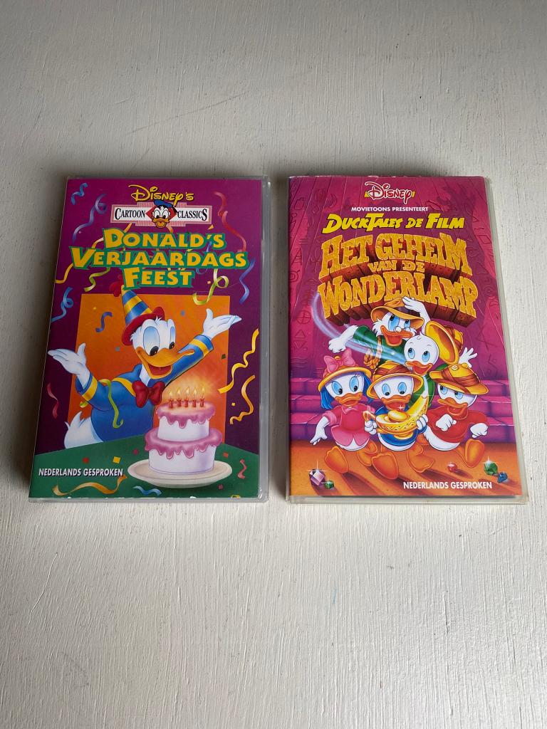 Donald's Verjaardags Feest & Geheim van de Wonderlamp VHS, Tekenfilm, Alle leeftijden, Ophalen of Verzenden, Zo goed als nieuw