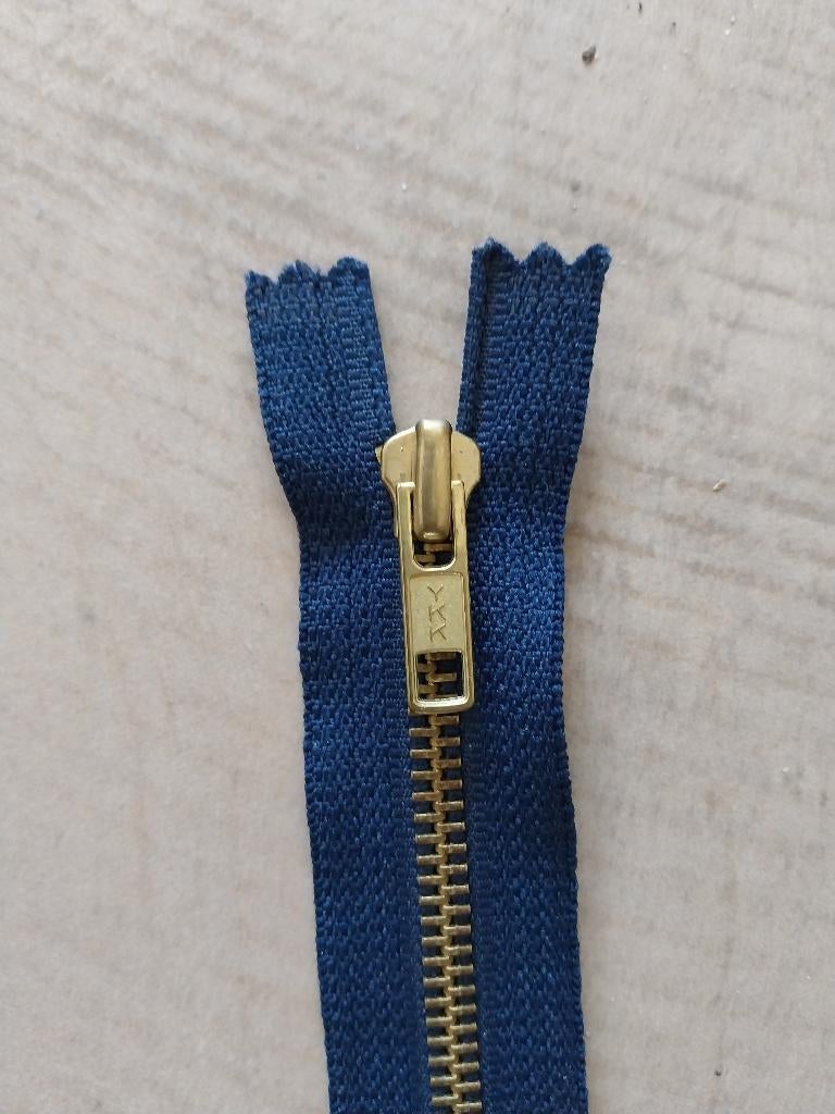 YKK donkerblauwe goudkleurige rits 12 cm NIEUW, Hobby en Vrije tijd, Naaien en Fournituren, Ophalen of Verzenden, Nieuw, Rits of Sluiting