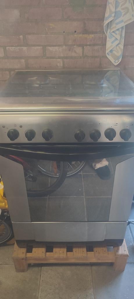 Vrijstaand gasfornuis met elektrischoven, Ophalen