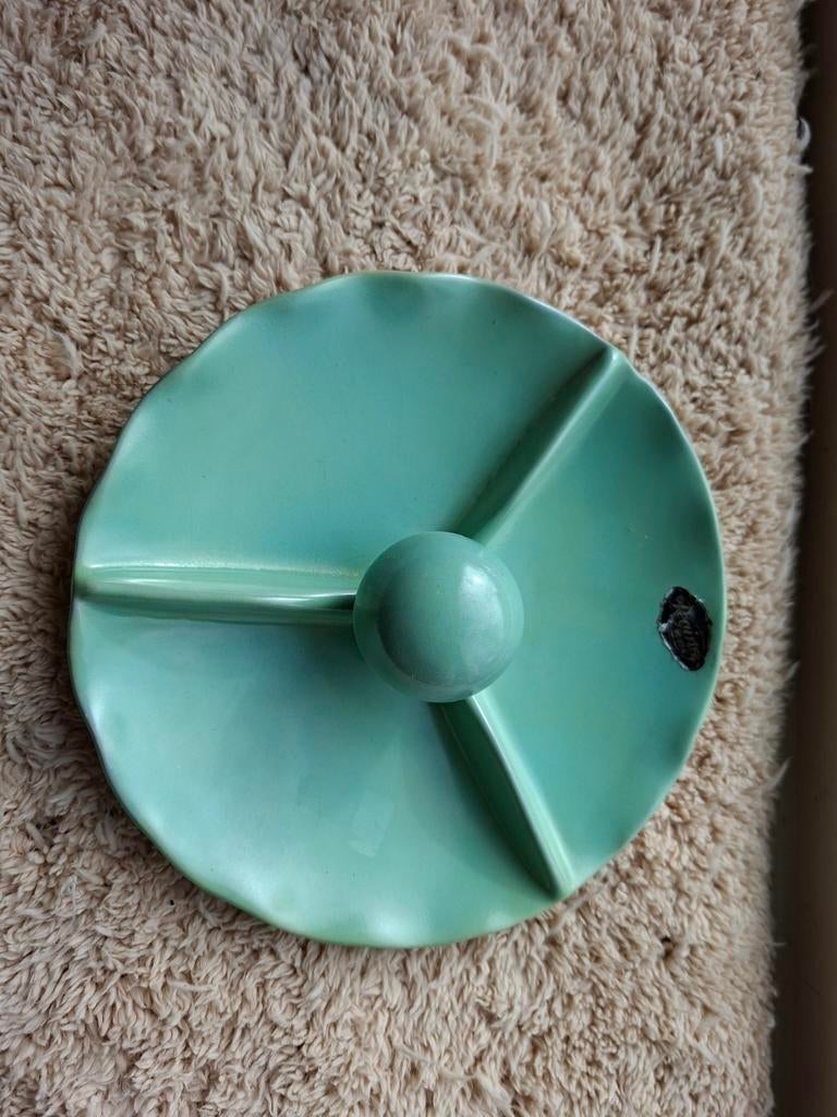 Groene drievaksschaal Regina Gouda, Ophalen