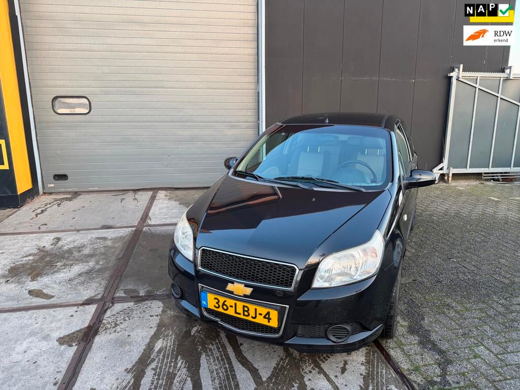 Chevrolet Aveo 1.2 16V LS+ | APK | Airco | 100% onderhouden, Voorwielaandrijving, Aveo, 4 cilinders, 400 kg