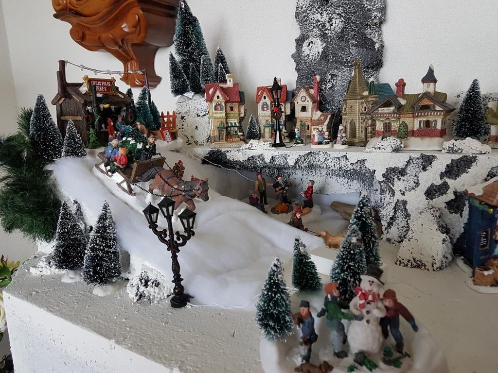 Kerstdorp kompleet met licht, Ophalen