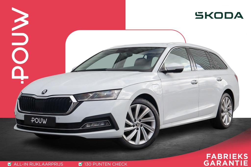 Skoda Octavia Combi 1.4 TSI 204pk iV PHEV Business Edition P, Auto's, 12 maanden, Stof, Gebruikt, 1553 kg