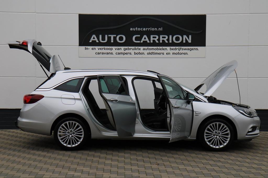 Opel Astra Sports Tourer 1.4 Turbo 150PK 120 Jaar Edition, Voorwielaandrijving, Stof, Gebruikt, 4 cilinders