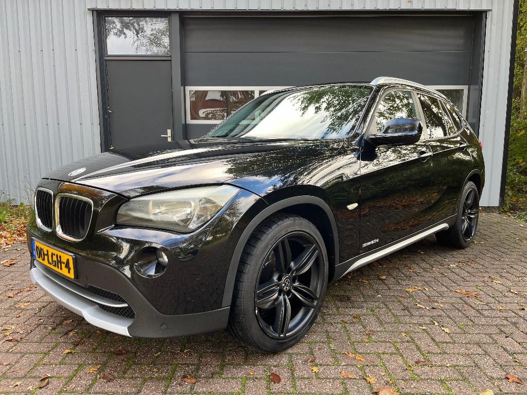BMW X1 2.0D Sdrive Automaat - Executive - NAP, Auto's, Euro 5, Stof, Zwart, 4 cilinders