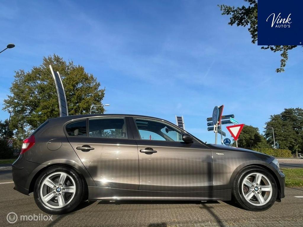 BMW 1-serie 116i High Executive |Leer|Xenon|Schuifdak|LM Vel, Achterwielaandrijving, Gebruikt, 4 cilinders, Bruin