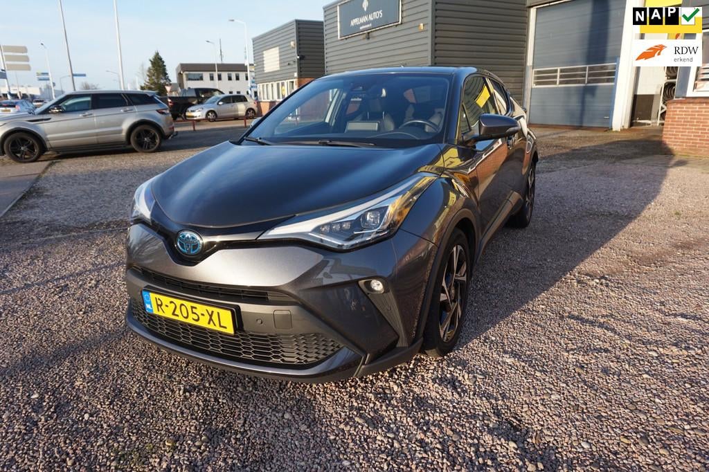 Toyota C-HR 1.8 Hybrid Style, 12-22 , nieuwstaat org Ned , N, Auto's, Toyota, Euro 6, 4 cilinders, Adaptive Cruise Control, Grijs