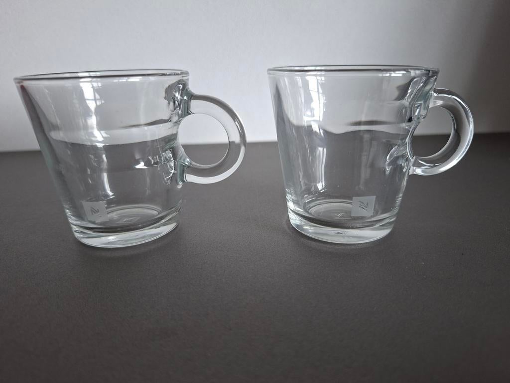 2 Nespresso espresso glaasjes 80 ml, Nieuw, Ophalen of Verzenden, Glas, Overige stijlen