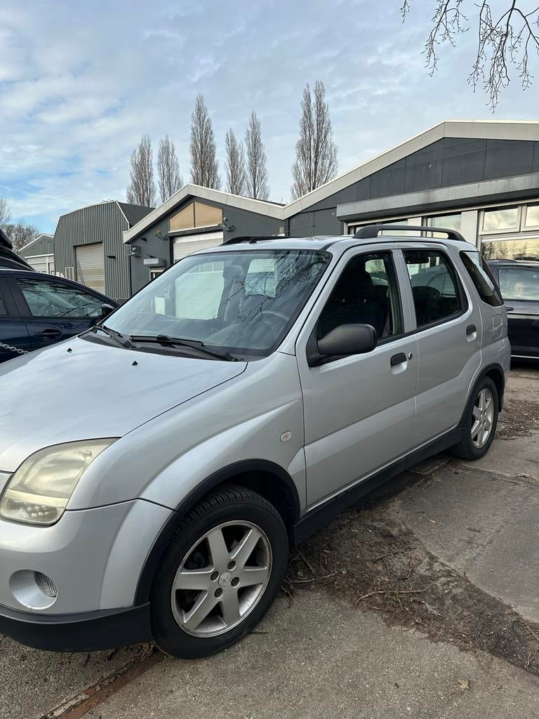 Suzuki Ignis 1.5 5D 4X4 2004 Grijs, Auto's, Suzuki, 31 €/maand, 4 cilinders, Ignis, Handgeschakeld