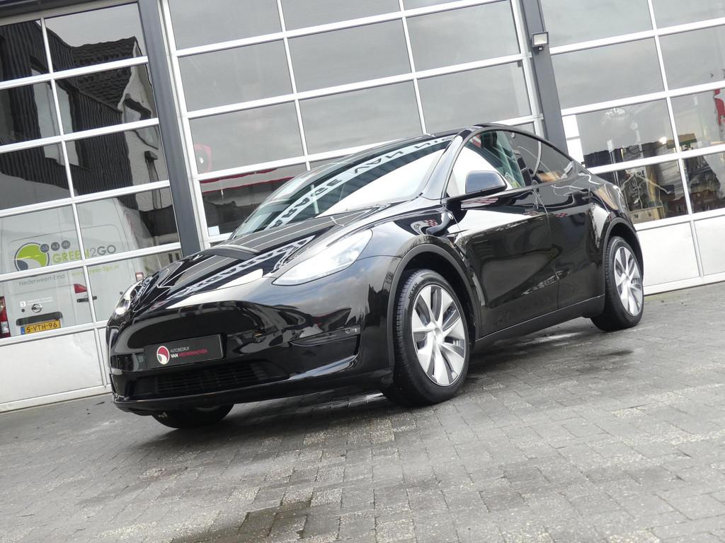 Tesla Model Y Long Range AWD 75 kWh *t/m 10de bouwjaar garan, Stof, Gebruikt, Met garantie (alle), Zwart