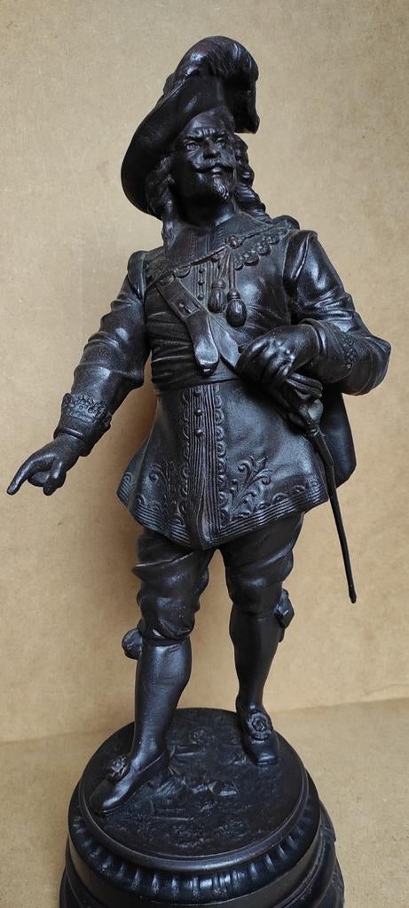 Beeld voorstellende een musketier., Ophalen