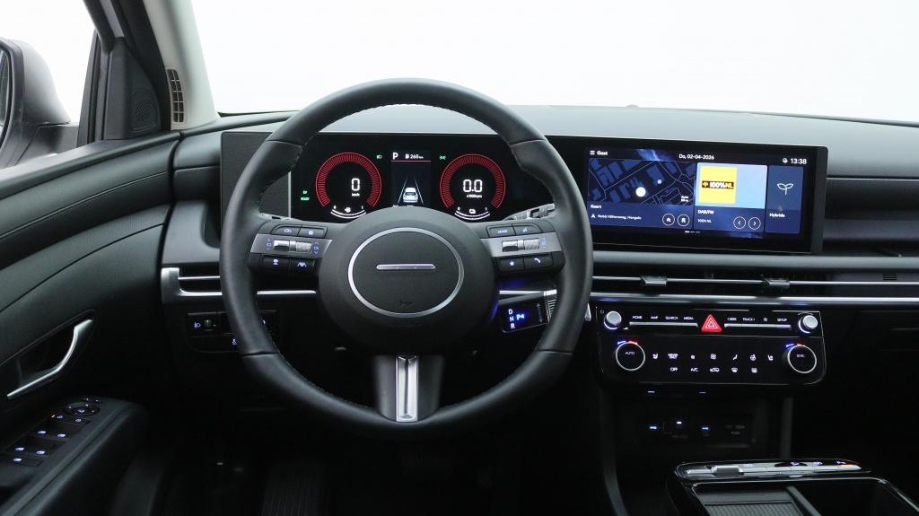 Hyundai Tucson 1.6 T-GDI HEV Comfort | Stoelverwarming | Nav, 12 maanden, Stof, Gebruikt, 4 cilinders