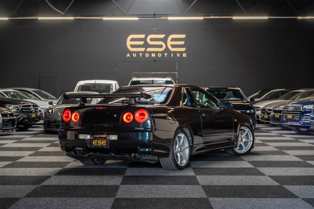 Nissan Skyline R34 GTR V-spec Midnight Purple II, Auto's, Stof, Gebruikt, Zwart, Overige kleuren