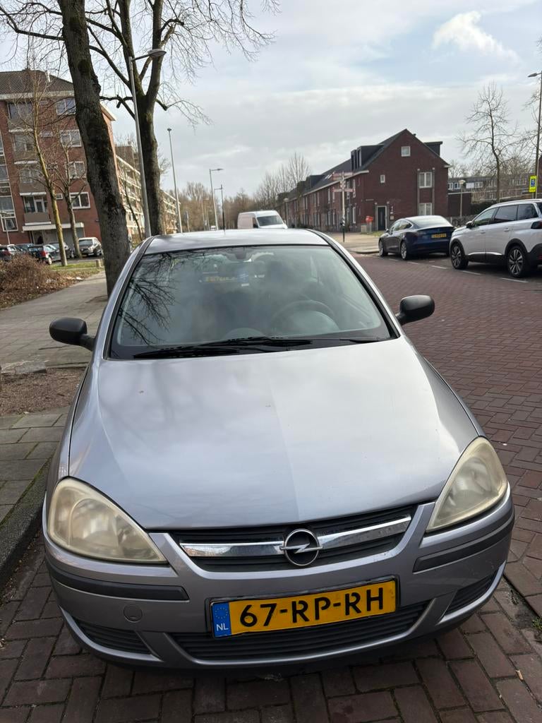 Opel Corsa 1.0 3D 2005 Grijs, Auto's, Voorwielaandrijving, 450 kg, Origineel Nederlands, Handgeschakeld
