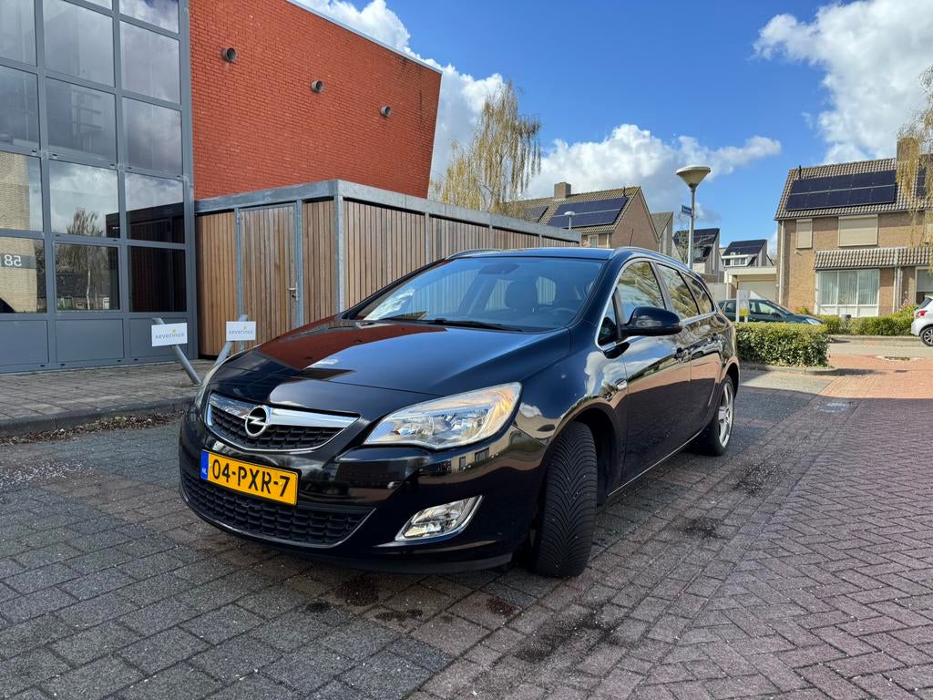 Opel Astra Sports Tourer 2011 - 1.4 74KW - Zwart, Auto's, Voorwielaandrijving, 4 cilinders, Zwart, Origineel Nederlands