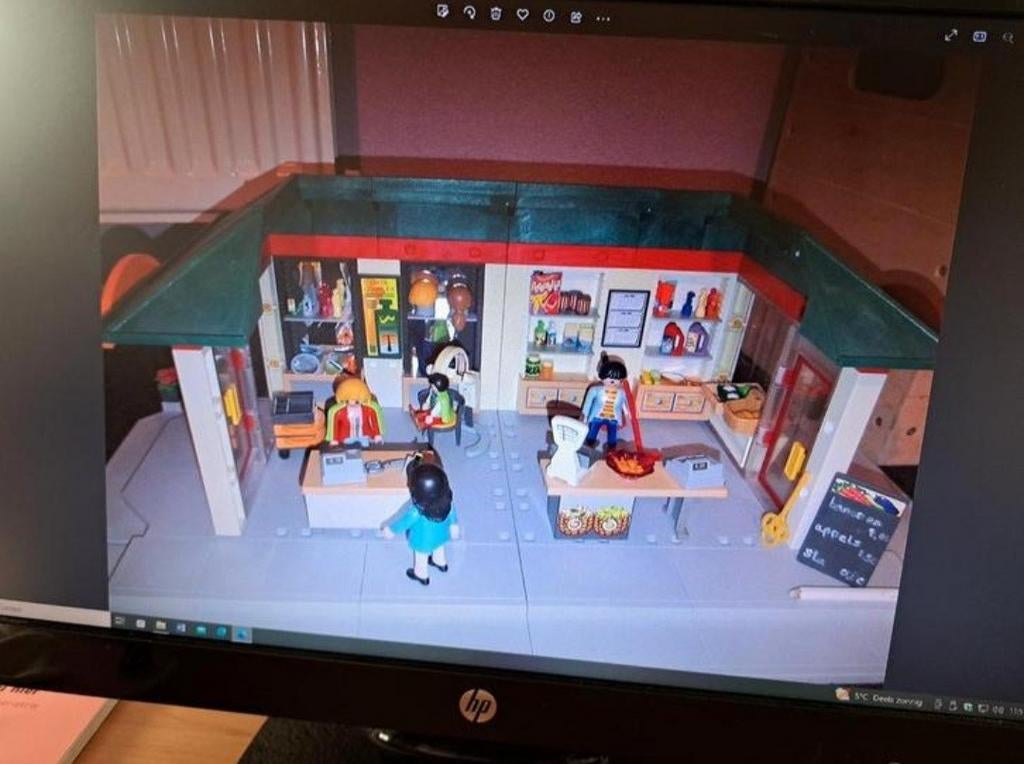 Playmobil kapsalon en kruidenierswinkel, Ophalen