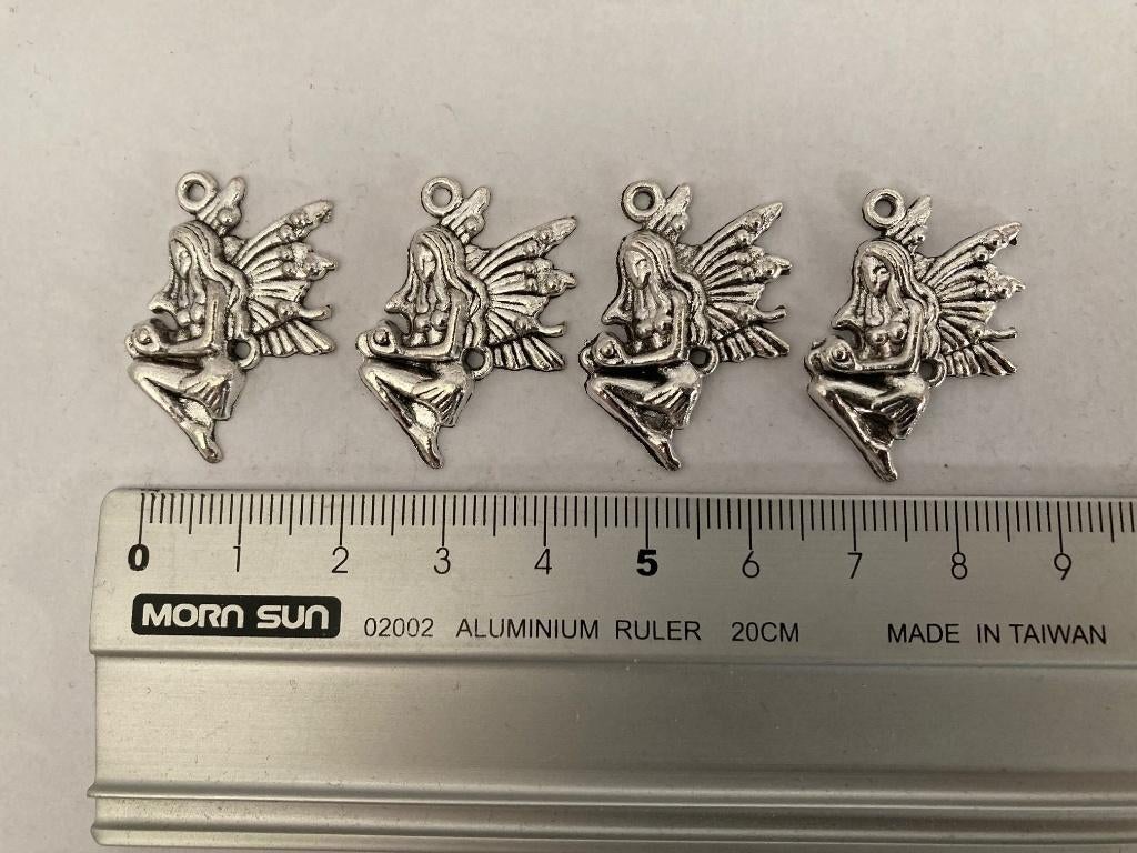 4 hangers knielend elfje, Ophalen of Verzenden, Nieuw, Zilver, Overige materialen