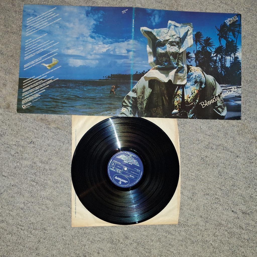 10 cc - bloody tourists, Ophalen, Zo goed als nieuw, 12 inch