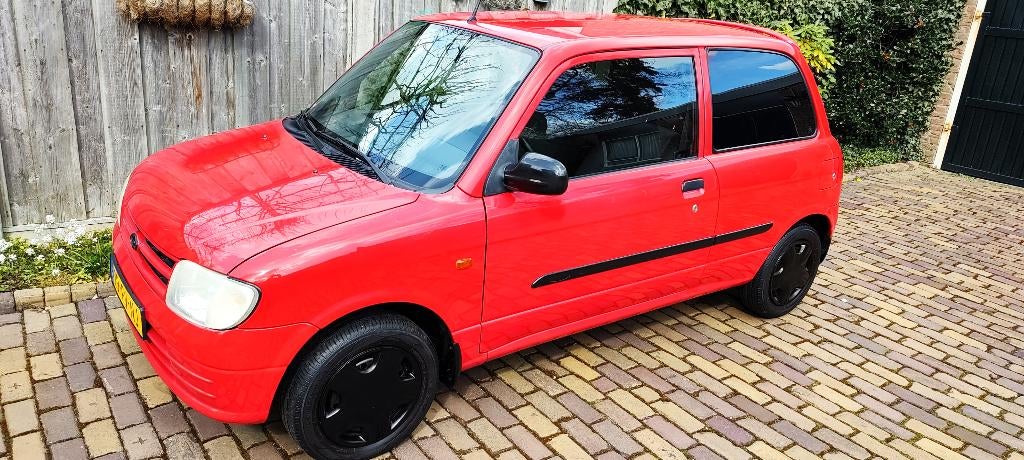 2 X Daihatsu Cuore automaat grijs en rood,  klein maar fijn., Auto's, Stof, Daihatsu, Grijs, Particulier