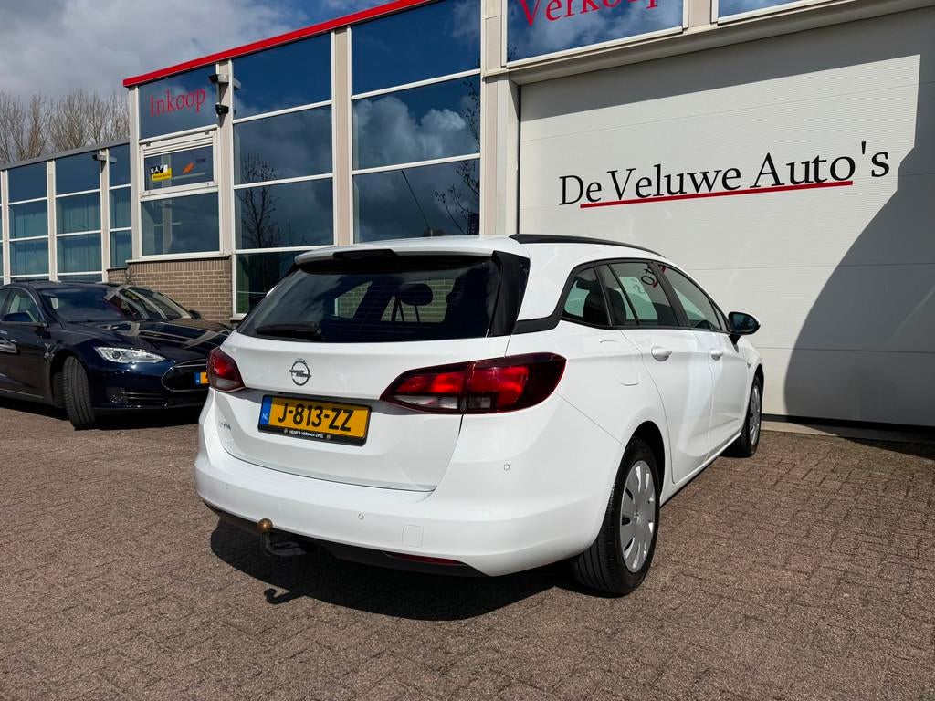 Opel Astra Sports Tourer 1.2 Business Executive|Trekhaak|CAM, Voorwielaandrijving, Stof, Gebruikt, 1199 cc