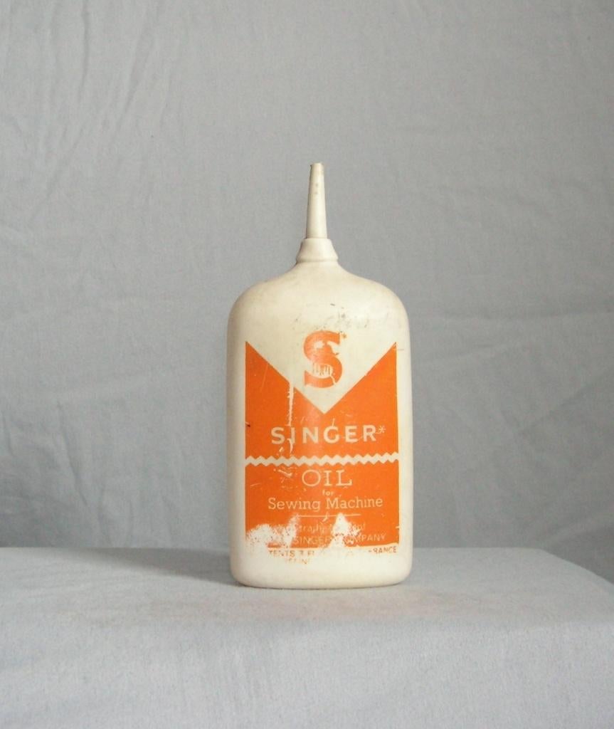 SINGER LEEG OLIE BUSJE MET SINGER TEKST NR D-25 ZONDER DOP, Ophalen of Verzenden