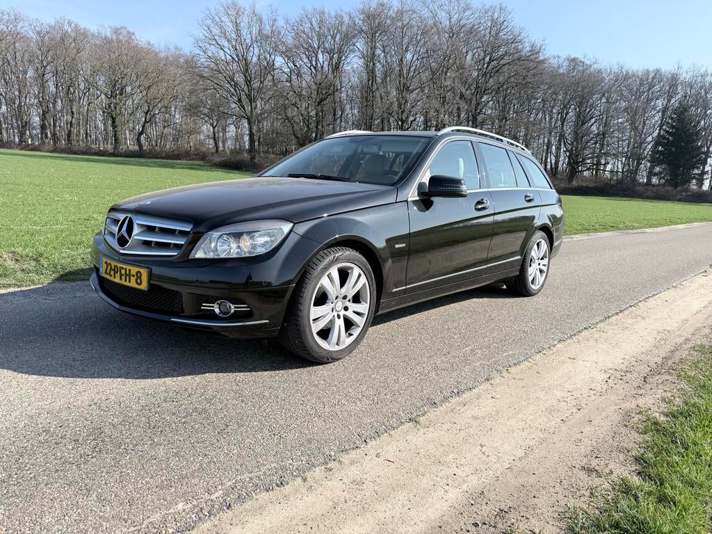 Mercedes-Benz C-Klasse 1.8 C180 CGI Estate 2011 Zwart, Auto's, Mercedes-Benz, Achterwielaandrijving, 1800 kg, Beige, Zwart