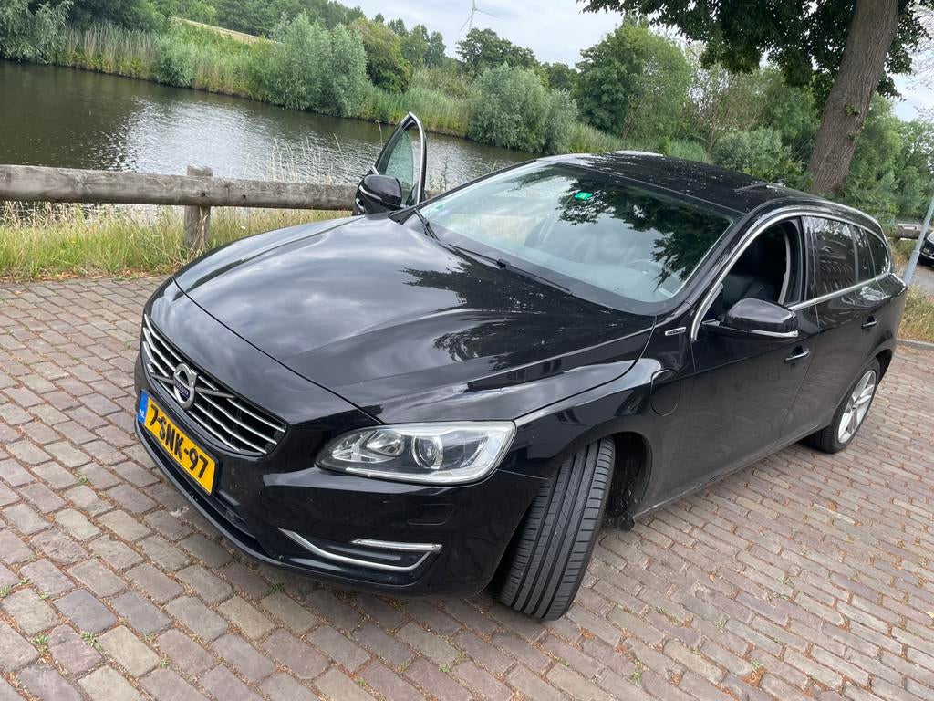 Volvo V60 D6 215pk Plug-in Hybrid 2013 Zwart, Auto's, 1800 kg, Zwart, USB, Zwart