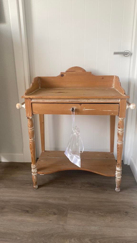 Grenen wastafel, Ophalen