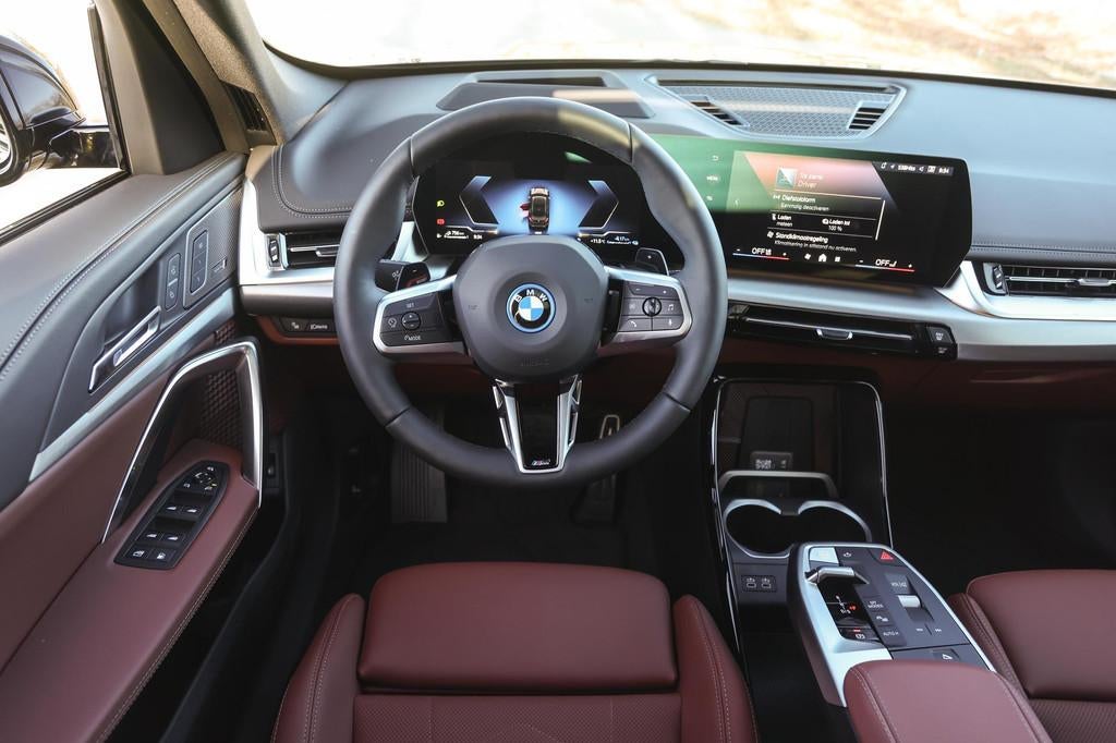 BMW X1 xDrive25e High Executive M Sport Automaat / Panoramad, Euro 6, Met garantie (alle), Zwart, Hybride Elektrisch/Benzine