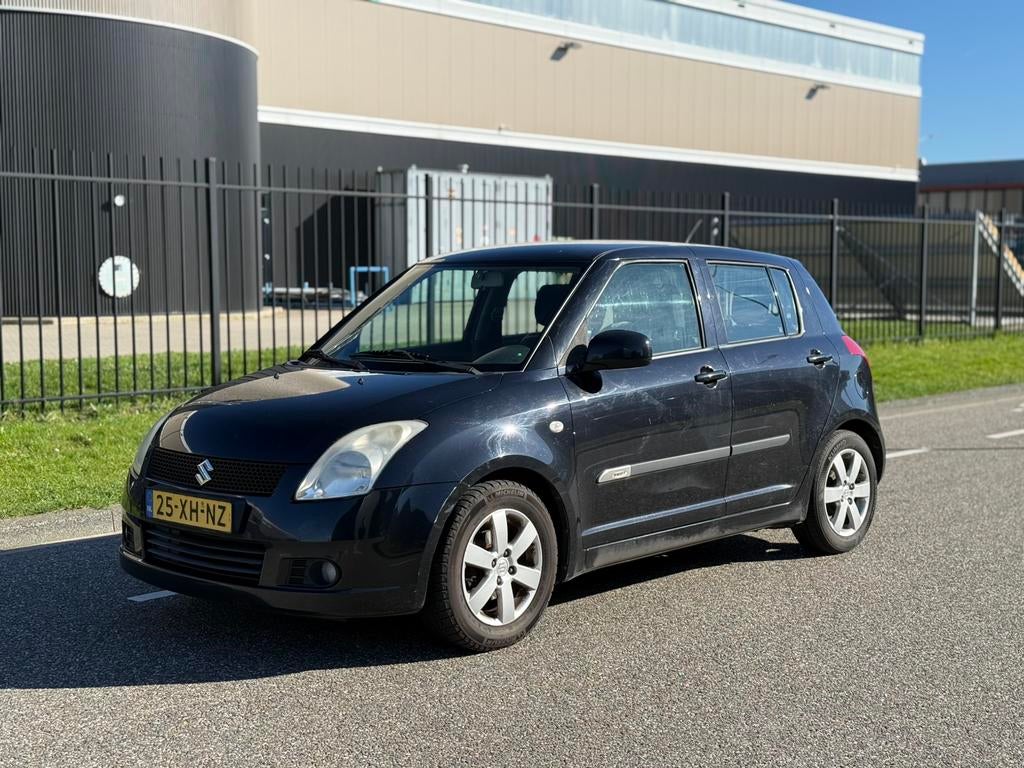 Suzuki Swift 1.3 5DRS 2007 Zwart Airco, Elek Ramen, Voorwielaandrijving, Stof, 40 €/maand, Zwart