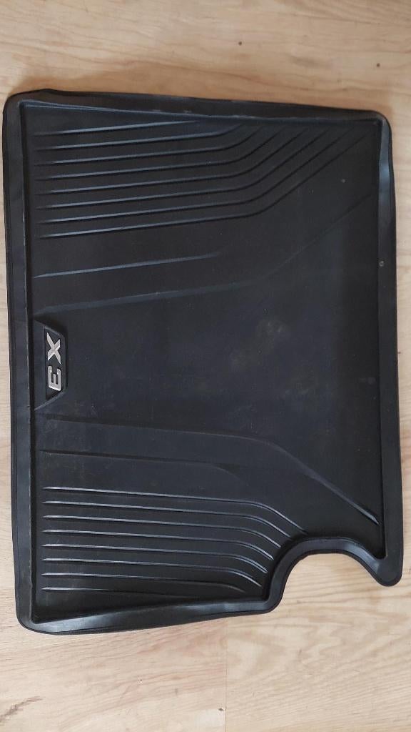 kofferbakmat, Ophalen