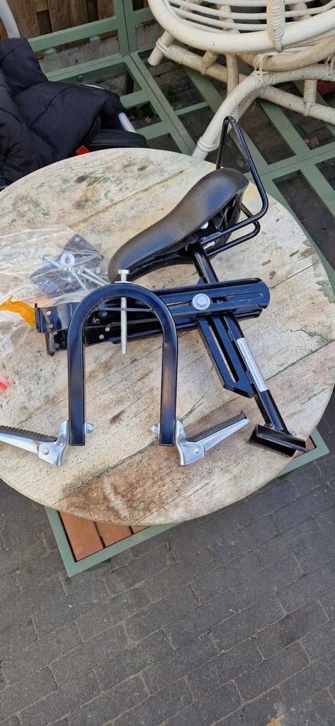 Kinderzitje voorop de fiets, Motoren, Ophalen