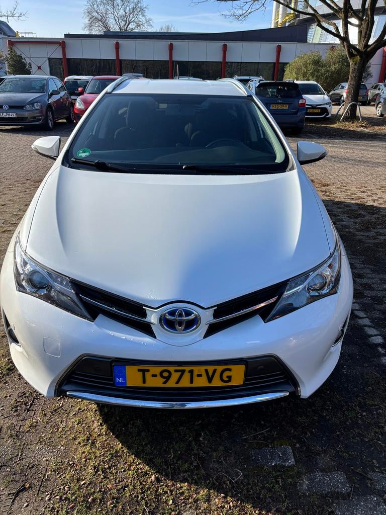Toyota Auris 1.8 Hybrid Touring Sports CVT 2015 Wit, 345 kg, Wit, 26 km/l, Te koop