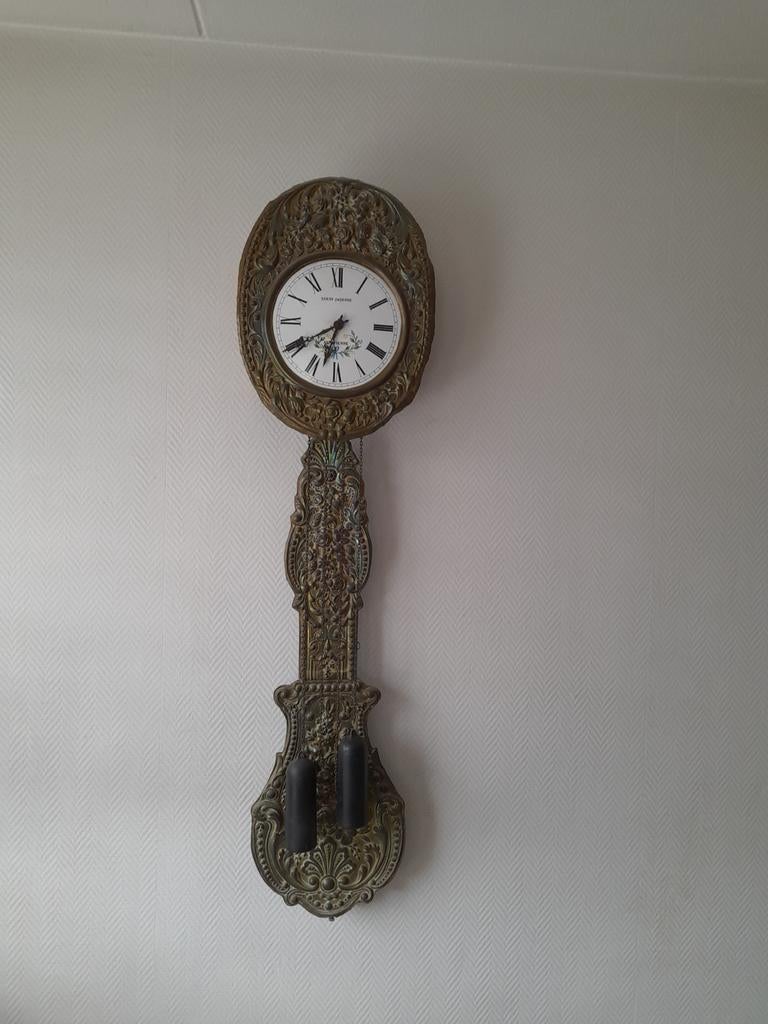 Mooie Franse klok, Ophalen