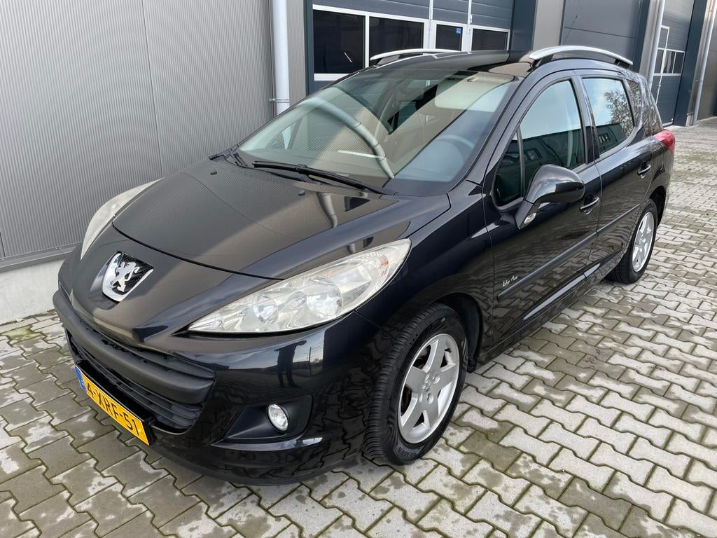Peugeot 207 1.4 95pk Blue Lease 2010 2e eigenaar, Voorwielaandrijving, Stof, Zwart, Zwart