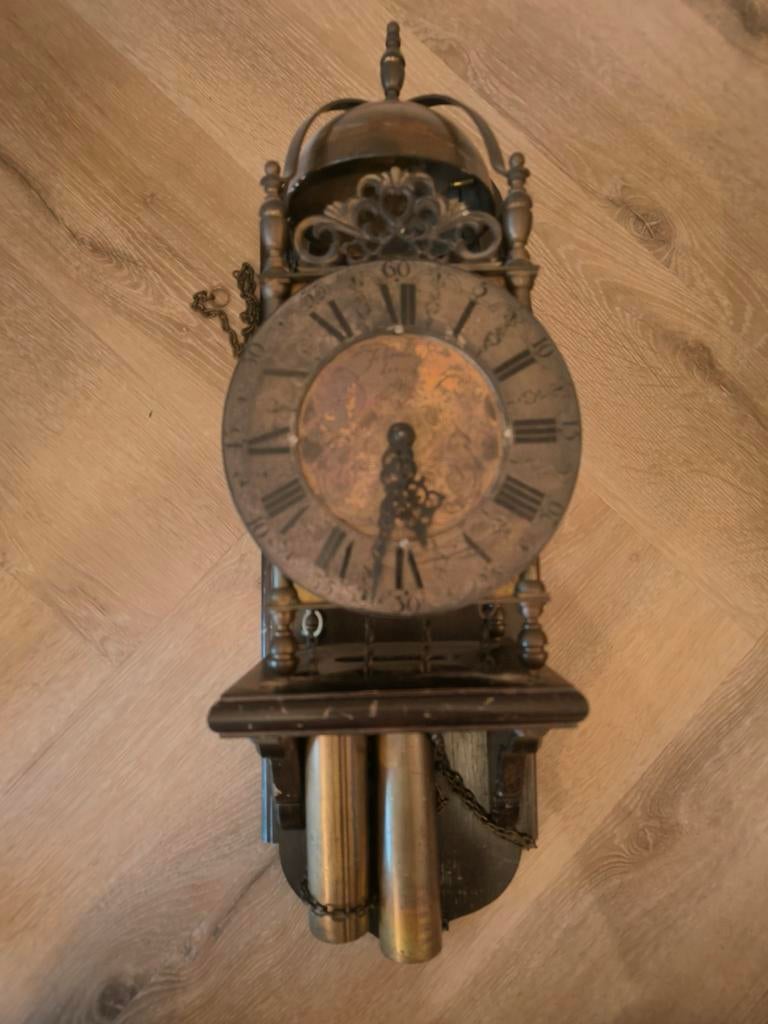 Antieke Lantaarnklok, Ophalen