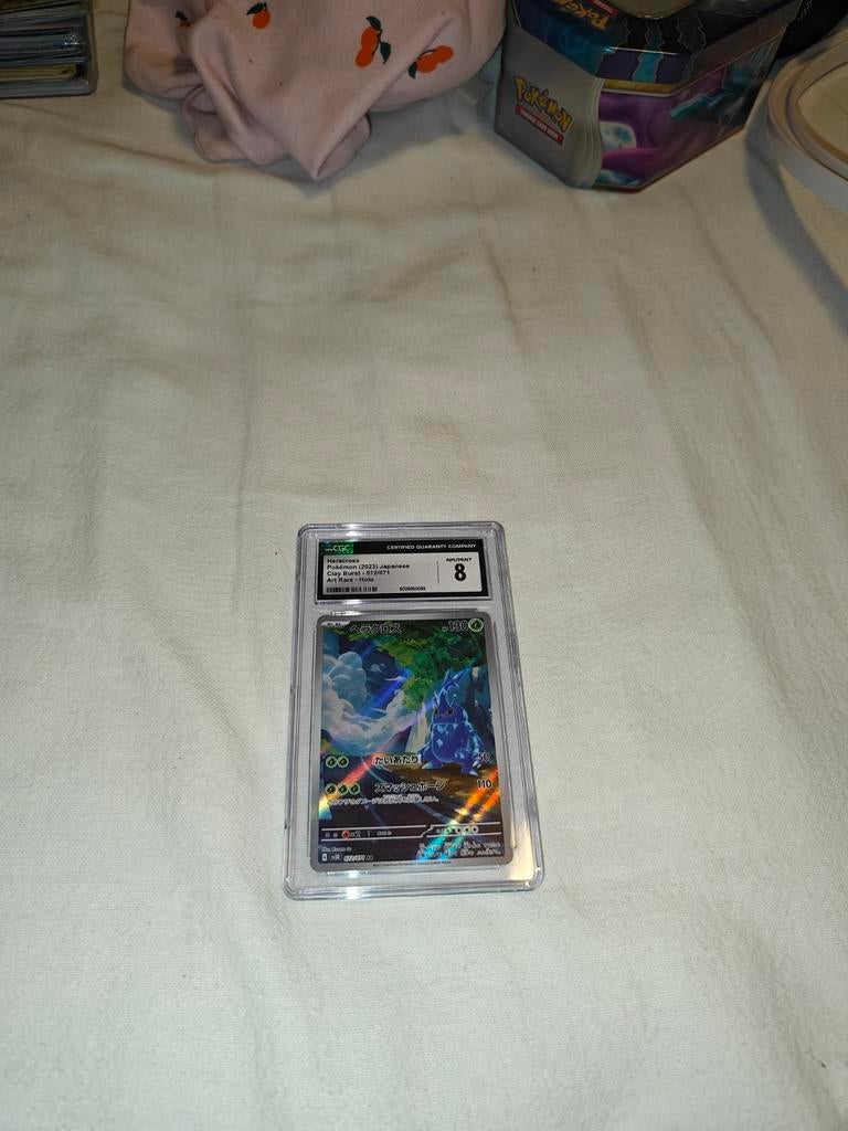 Clay Burst - Heracross #72 Graded 8, Ophalen of Verzenden, Zo goed als nieuw, Losse kaart, Foil