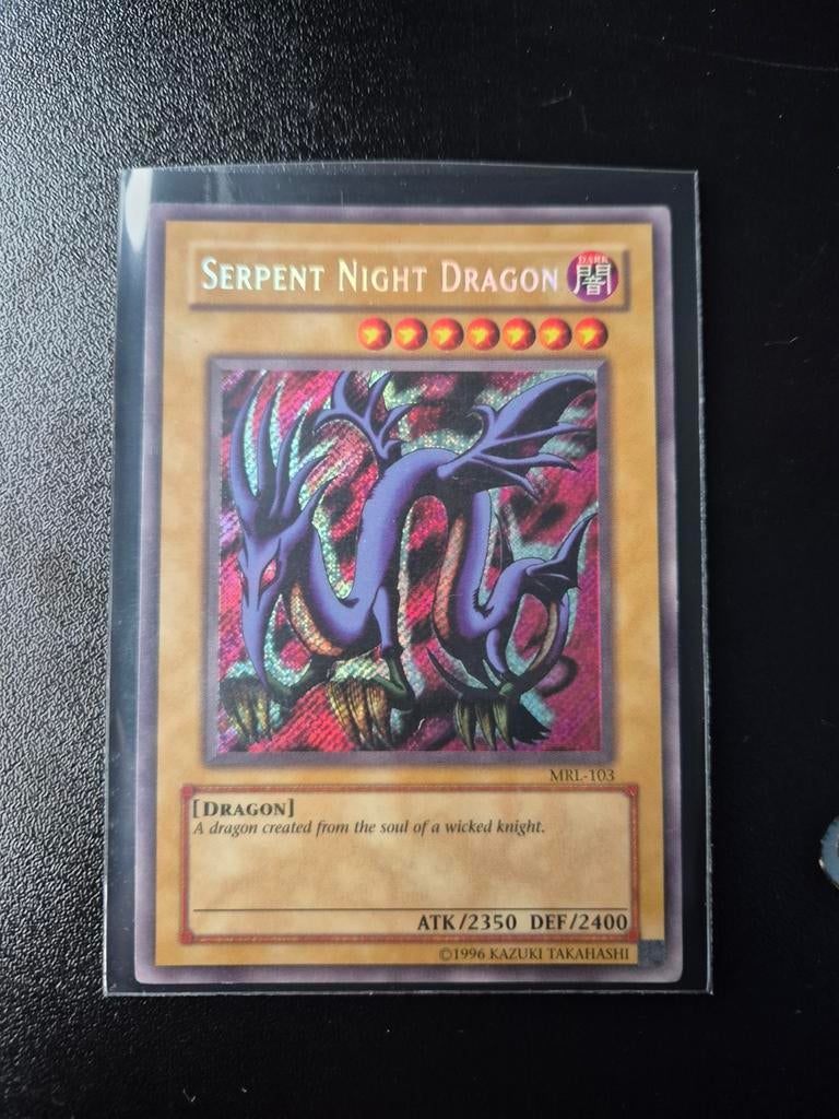Yu-Gi-Oh! Serpent Night Dragon MRL-103 Secret Rare, Ophalen of Verzenden, Gebruikt, Losse kaart, Foil