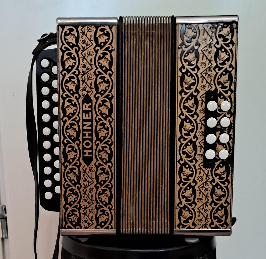 Hohner diatonische Accordeon of Trekzak met lesboek, Gebruikt, Overige formaten, Met koffer, Ophalen of Verzenden