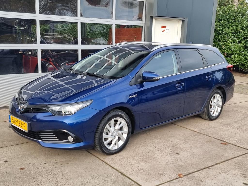 Toyota Auris Touring Sports 1.8 Hybrid Energy Plus, 28 km/l, Gebruikt, Euro 6, Blauw