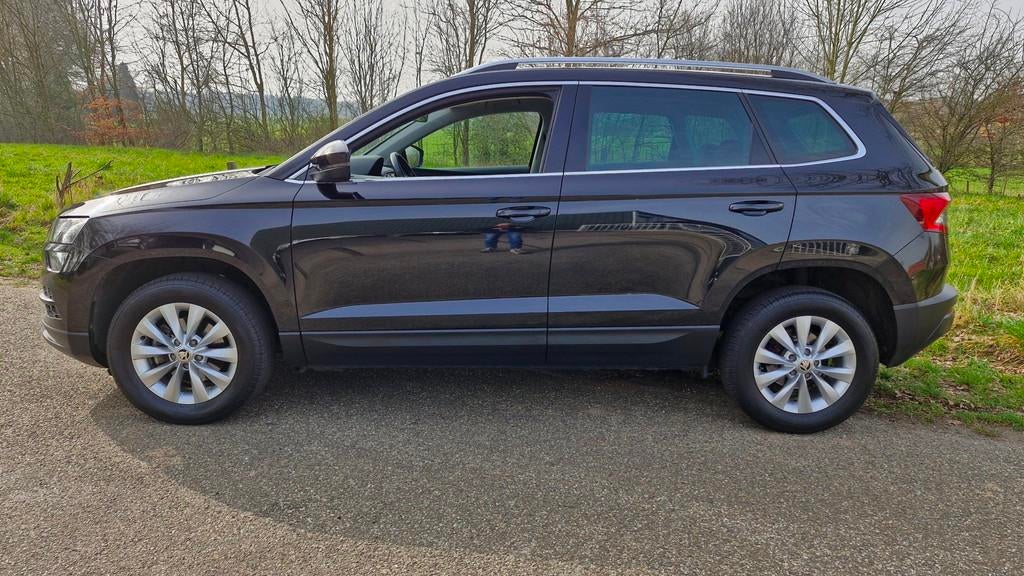 Skoda Karoq 1.0 TSI Clever Edition 116PK | Rijklaarprijs | C, Auto's, Voorwielaandrijving, Stof, Gebruikt, Adaptive Cruise Control