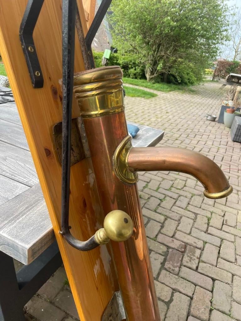 Antieke koperen pomp, Ophalen, Gebruikt