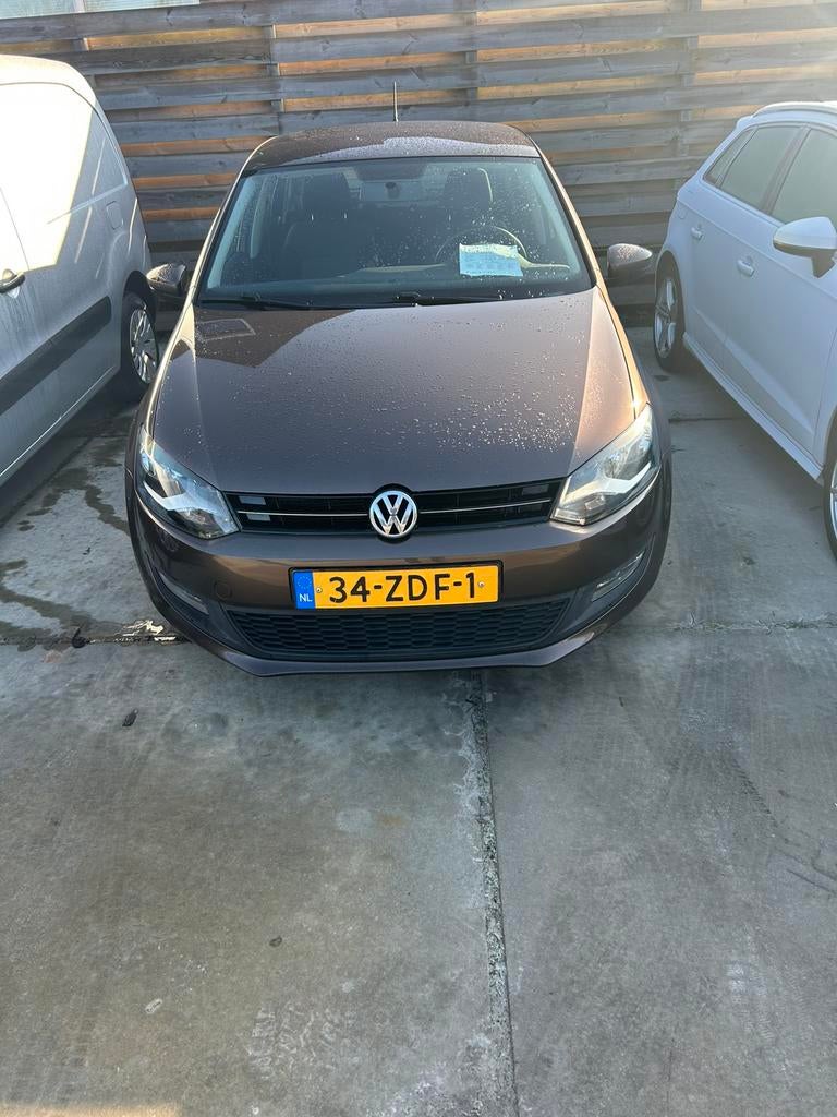 Volkswagen Polo 1.2 TSI 66KW 2013 Bruin, Auto's, Voorwielaandrijving, Euro 5, Stof, 40 €/maand