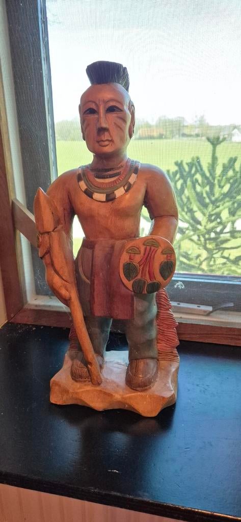 Houten indiaan beeld, Ophalen