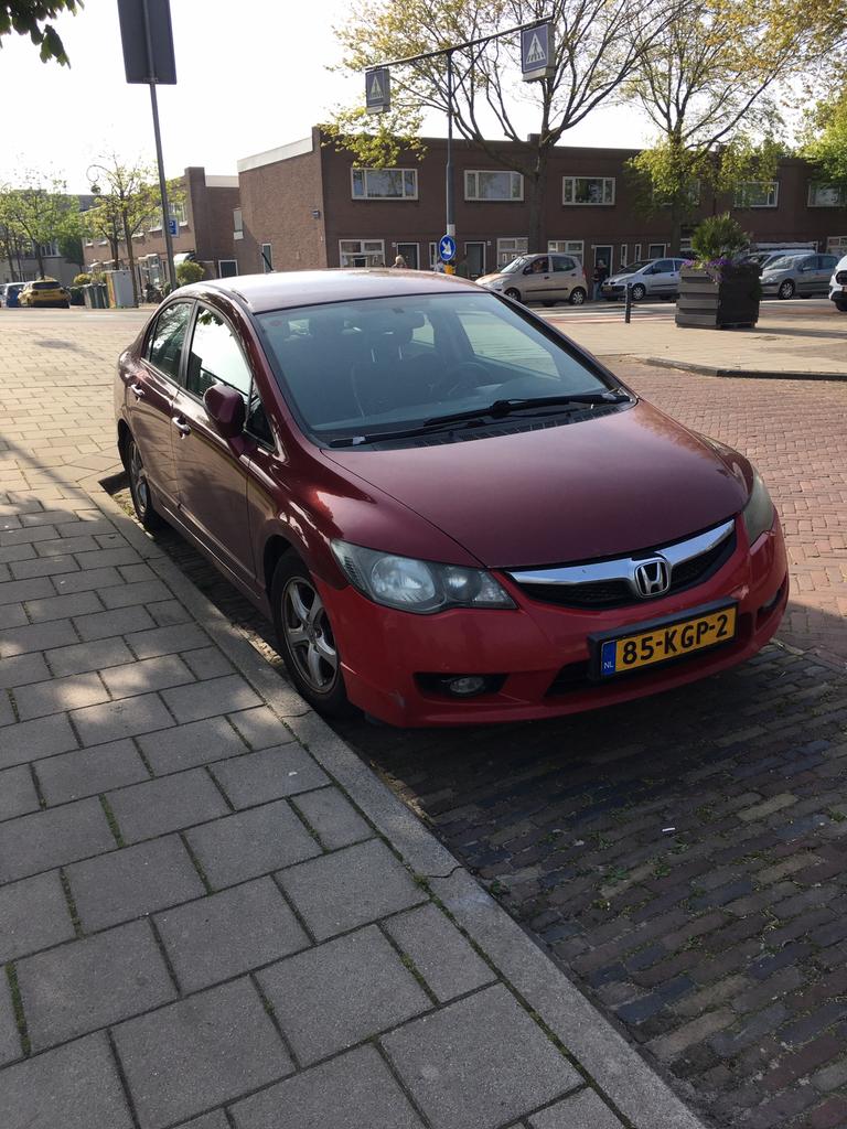Honda Civic 1.3 Vtec Hybrid 4DR C-tr. 2009 Rood, Auto's, Origineel Nederlands, Grijs, 22 km/l, Sedan