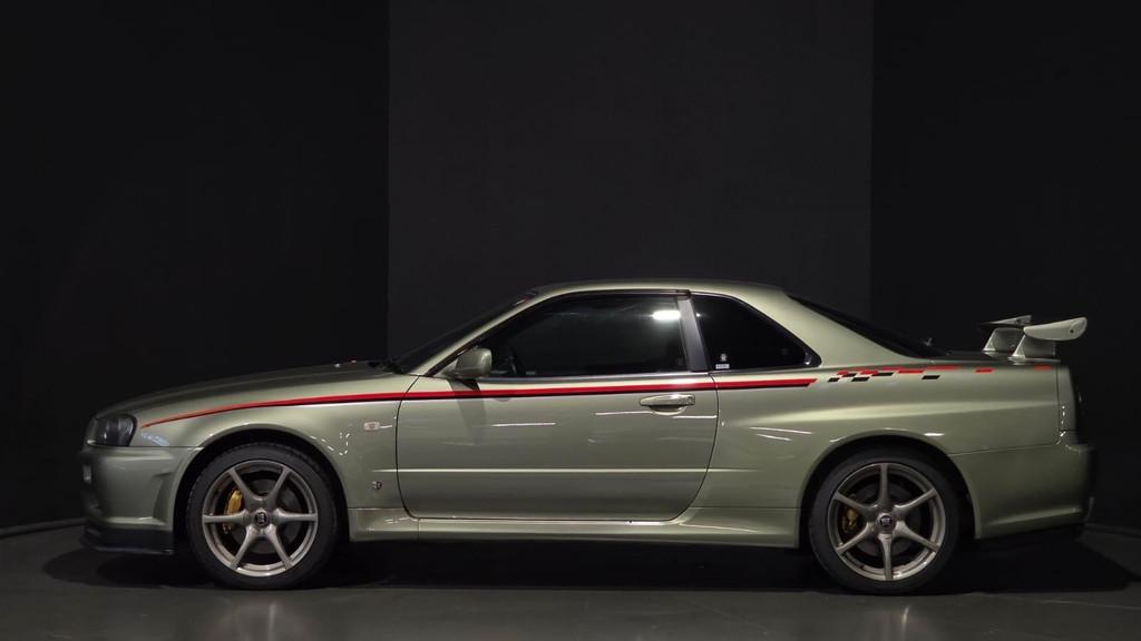 Nissan Skyline R34 GT-R M-Spec Nür Millennium Jade, Auto's, Stof, Gebruikt, Bedrijf, Handgeschakeld