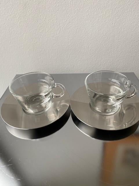 Nespresso, 2 kop en schotels uit de serie View., Ophalen of Verzenden, Overige stijlen, Kop(pen) en/of Schotel(s), Glas