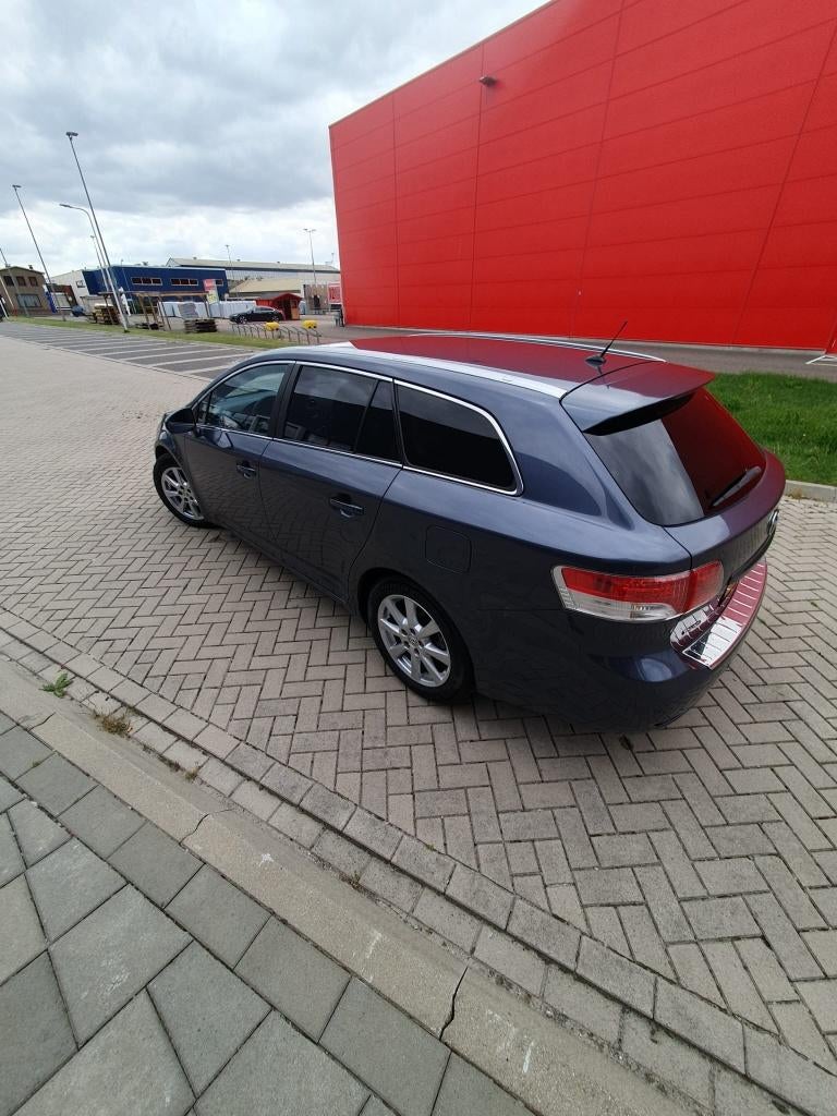 Toyota Avensis 1.8 Vvt-i Wagon 2009 Blauw, Auto's, 15 km/l, Avensis, Zwart, 4 cilinders