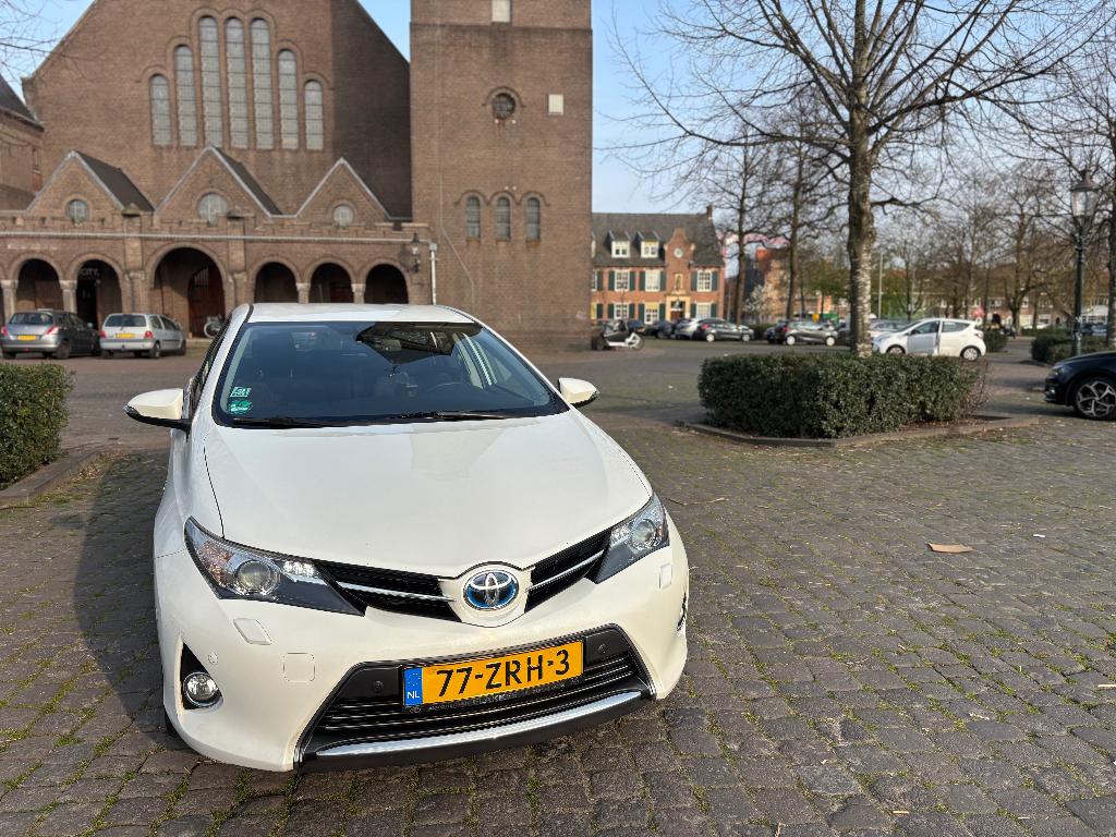 Toyota Auris 1.8 Hybrid 5DR 2013 Wit Executive full options, Auto's, Toyota, Particulier, Auris, ABS, Achteruitrijcamera, Adaptieve lichten